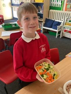 Child with a healthy pasta dish
