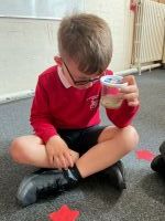 Child looking for bugs