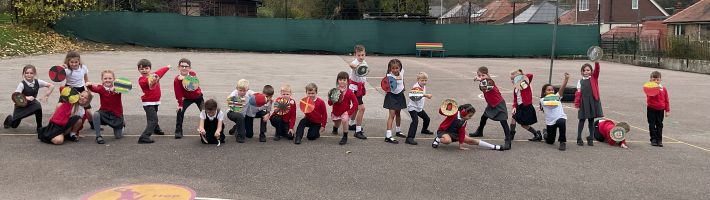 Children showing their Anglo-Saxon shields