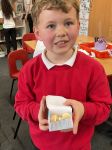 Child making a chocolate box