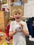 Child making a chocolate box