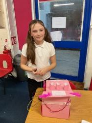 Child holding their electrical game