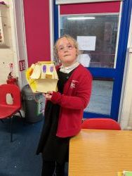 Child holding their electrical game