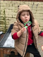 Child exploring bubbles