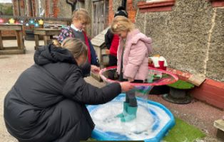 Child exploring bubbles