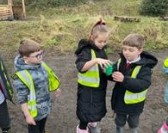 Children with a cup of water